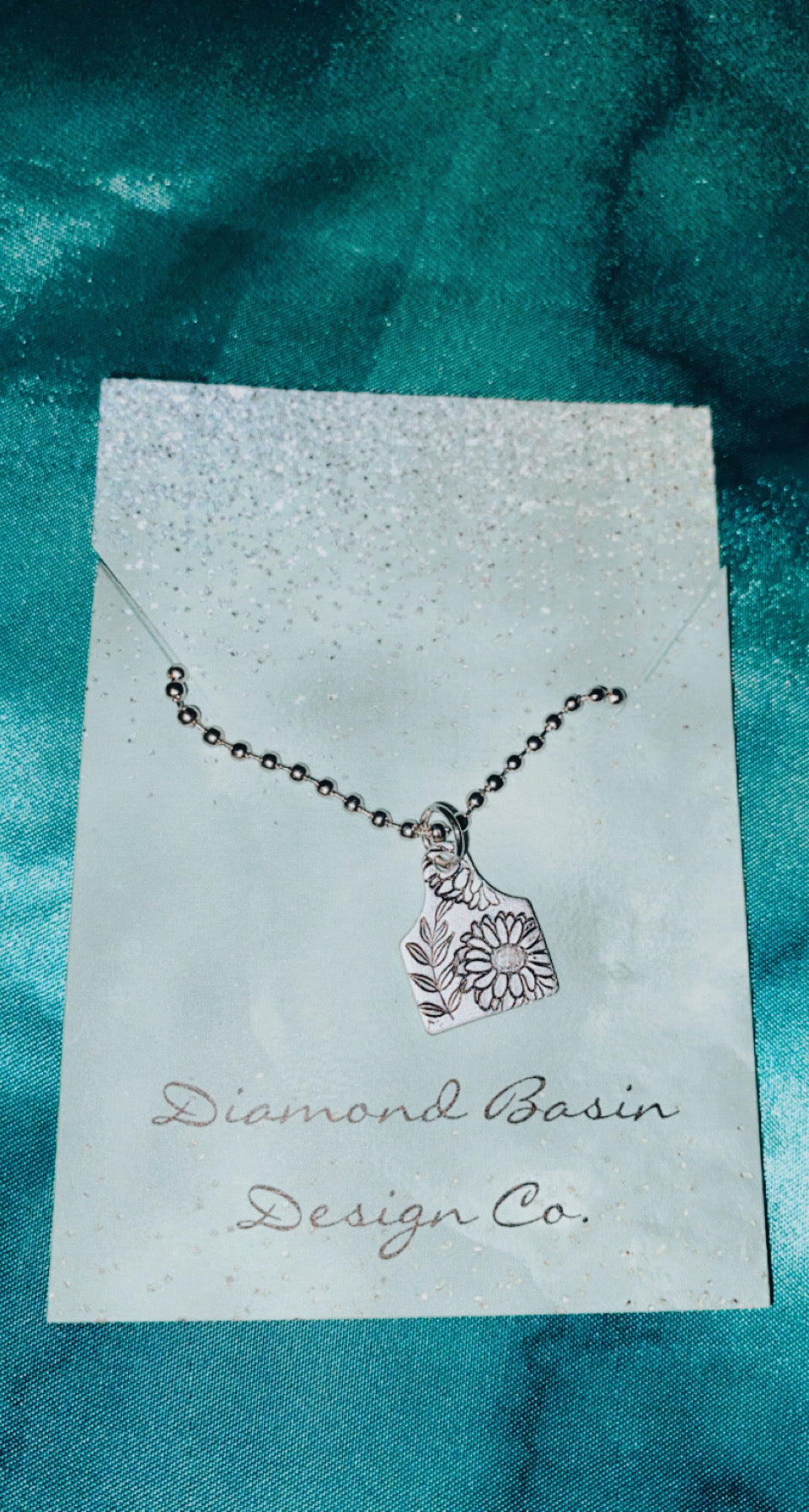 Floral cow tag necklace